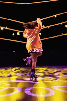 Me aka Shaneru, spinning on skates