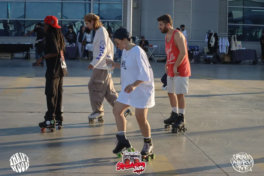 4 roller skaters, photographed mid dance routine gallery image 1